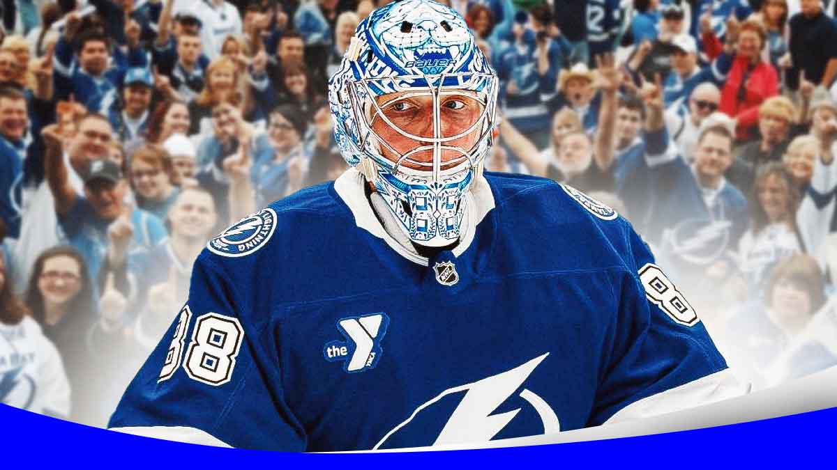 Tampa Bay Lightning goalkeeper Andrei Vasilevskiy saving a goal in the center, excited Tampa Bay Lightning fans on left and right sides, Amalie Arena (home arena of the Tampa Bay Lightning) and lightning bolts in background