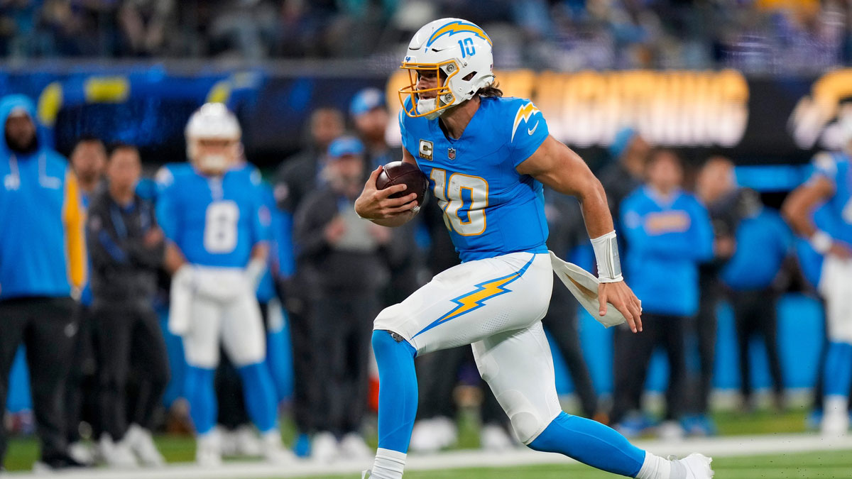 Los Angeles Chargers quarterback Justin Herbert (10) breaks away on a run in the fourth quarter of the NFL Week 11 game between the Los Angeles Chargers and the Cincinnati Bengals at SoFi Stadium in Inglewood, Calif., on Sunday, Nov. 17, 2024. The Chargers won 34-27.