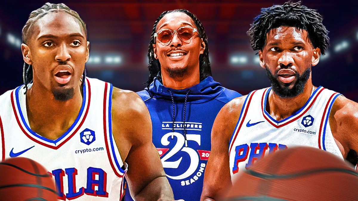 Lou Williams in the middle of Philadelphia 76ers stars Joel Embiid and Tyrese Maxey.