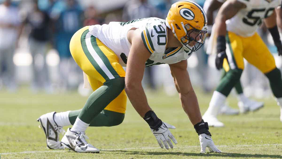 Green Bay Packers defensive lineman Lukas Van Ness (90) waits for the snap against the Jacksonville Jaguars during the second quarter at EverBank Stadium.