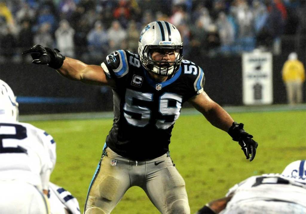Carolina Panthers linebacker Luke Kuechly (59) calls out to his defense during the second half of the game against the Indianapolis Colts at Bank of America Stadium.