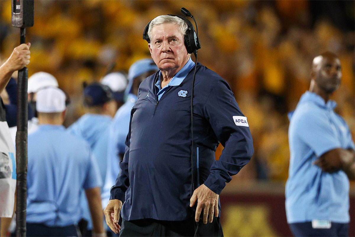 North Carolina football head coach Mack Brown looks on during the first half against the Minnesota Golden Gophers at Huntington Bank Stadium.