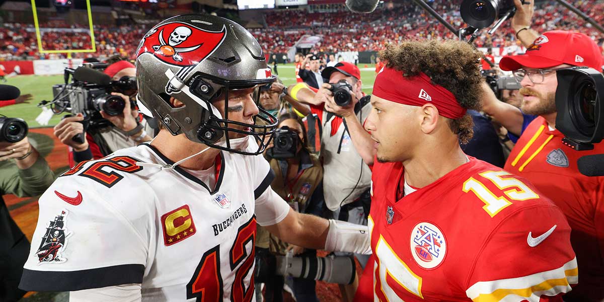 Oct 2, 2022; Tampa, Florida, USA; Tampa Bay Buccaneers quarterback Tom Brady (12) greets Kansas City Chiefs quarterback Patrick Mahomes (15) after a game at Raymond James Stadium. 