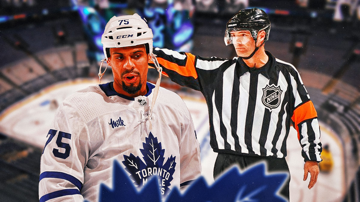 Maple Leafs F Ryan Reaves with a referee calling a penalty inside Scotiabank Arena