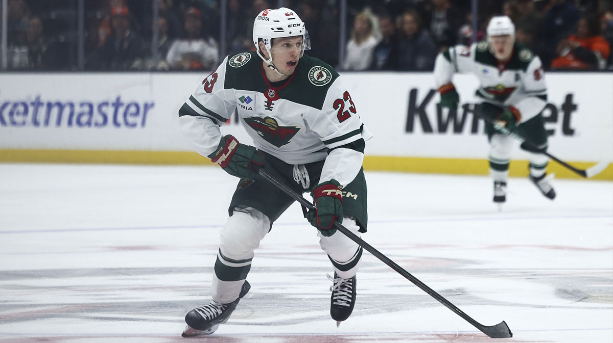 Minnesota Wild center Marco Rossi (23) skates with the puck during the third period of a hockey game against the Anaheim Ducks at Honda Center.