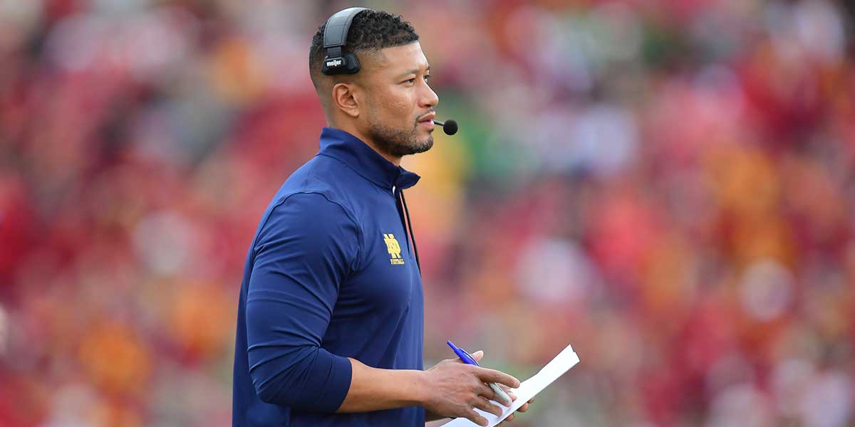 Nov 30, 2024; Los Angeles, California, USA; Notre Dame Fighting Irish head coach Marcus Freeman watches game action against the Southern California Trojans during the second half at the Los Angeles Memorial Coliseum.