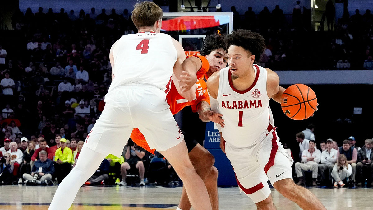 Nov 20, 2024; Birmingham, AL, USA;Alabama guard Mark Sears (1) works around a pick by Alabama forward Grant Nelson (4) as he is defended by Illinois forward Will Riley (7) in the CM Newton Classic at Legacy Arena.
