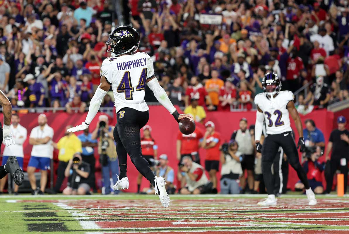 Baltimore Ravens cornerback Marlon Humphrey (44) celebrates after he intercepted the ball in the end zone against the Tampa Bay Buccaneers during the first half at Raymond James Stadium.