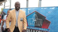 San Diego Chargers former running back Marshall Faulk arrives during the Professional Football HOF enshrinement ceremonies at the Tom Benson Hall of Fame Stadium.