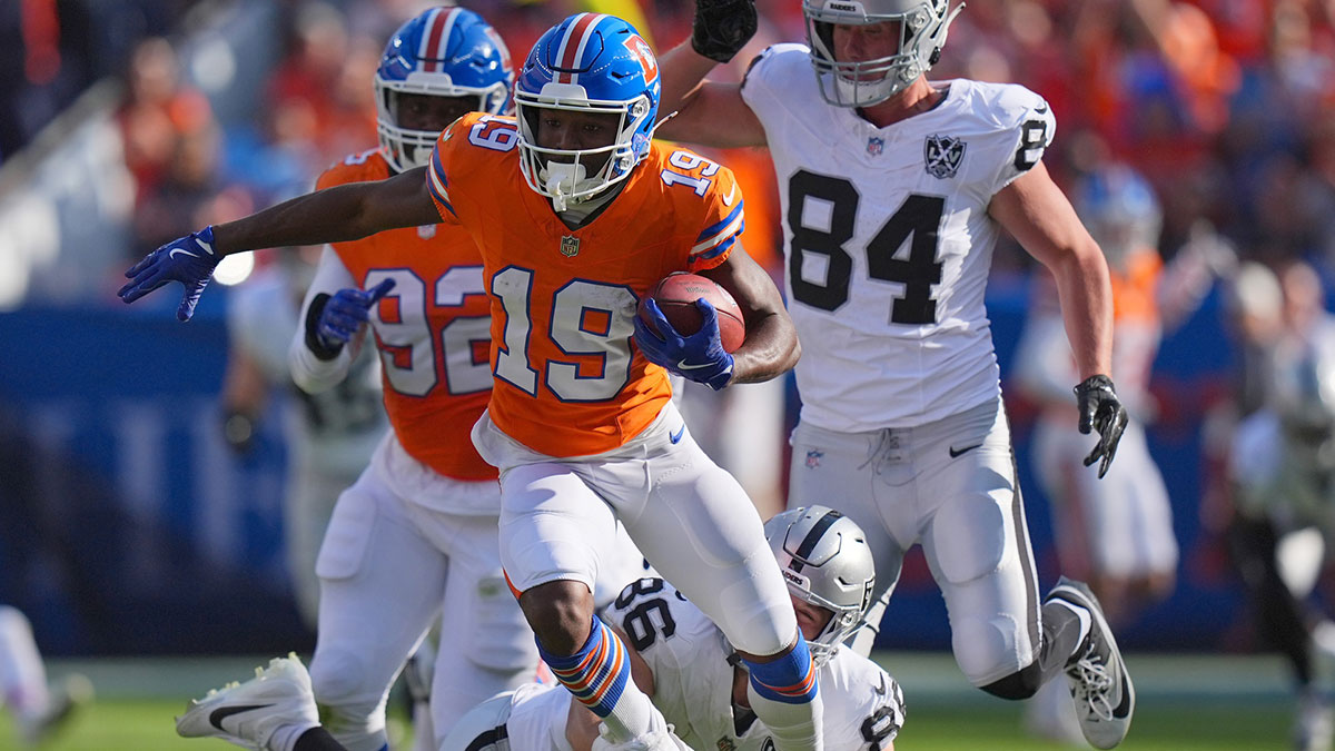 Denver Broncos wide receiver Marvin Mims Jr. (19) during a kickoff return in the second half against the Las Vegas Raiders at Empower Field at Mile High.