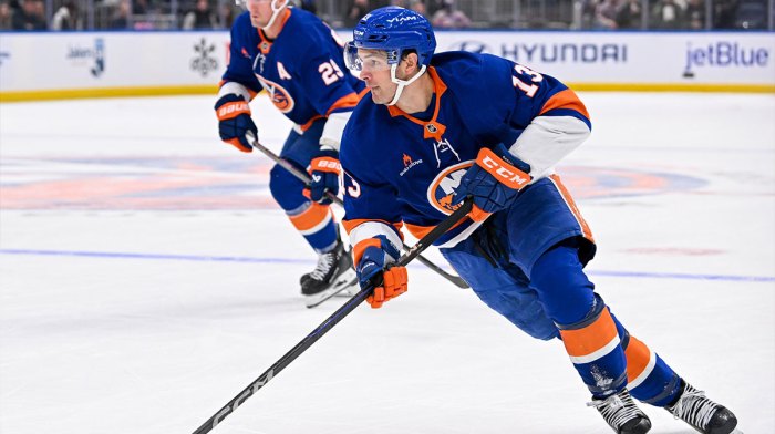 New York Islanders center Mathew Barzal (13) skates with the puck against the Florida Panthers during the second period at UBS Arena.