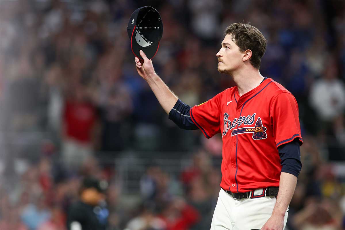 Atlanta Braves starting pitcher Max Fried (54) tips his hat to the crowd after being removed from a game against the Kansas City Royals in the ninth inning at Truist Park.