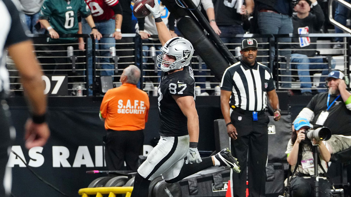 Las Vegas Raiders tight end Michael Mayer (87) celebrates as he scores a touchdown in the second quarter against the Los Angeles Chargers at Allegiant Stadium.