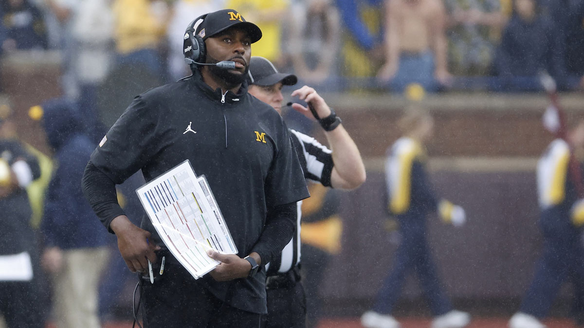 Michigan Wolverines head coach Sherrone Moore on the sideline in the first half against the Minnesota Golden Gophers at Michigan Stadium.