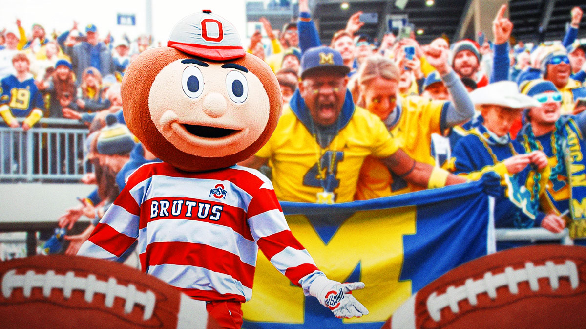 Celebrating Michigan Wolverines fans with Brutus Buckeye upset, his hands on his face if possible