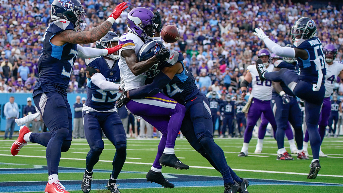 Tennessee Titans safety Mike Brown (44) breaks up a pass intended for Minnesota Vikings wide receiver Jordan Addison (3) during the second quarter at Nissan Stadium in Nashville, Tenn., Sunday, Nov. 17, 2024.