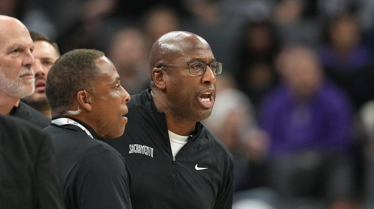 Sacramento Kings head coach Mike Brown (center) yells after receiving a technical foul during the second quarter against the Brooklyn Nets at Golden 1 Center.
