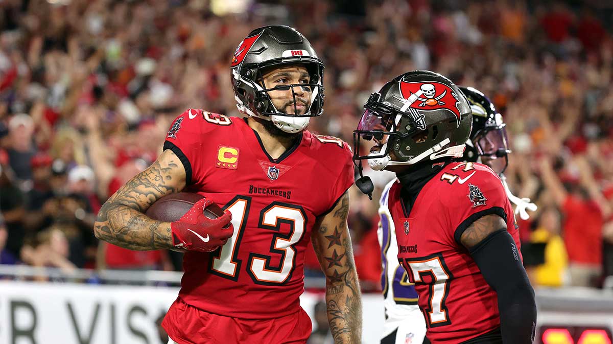 Tampa Bay Buccaneers wide receiver Mike Evans (13) catches the ball for a touchdown against the Baltimore Ravens during the first quarter at Raymond James Stadium.