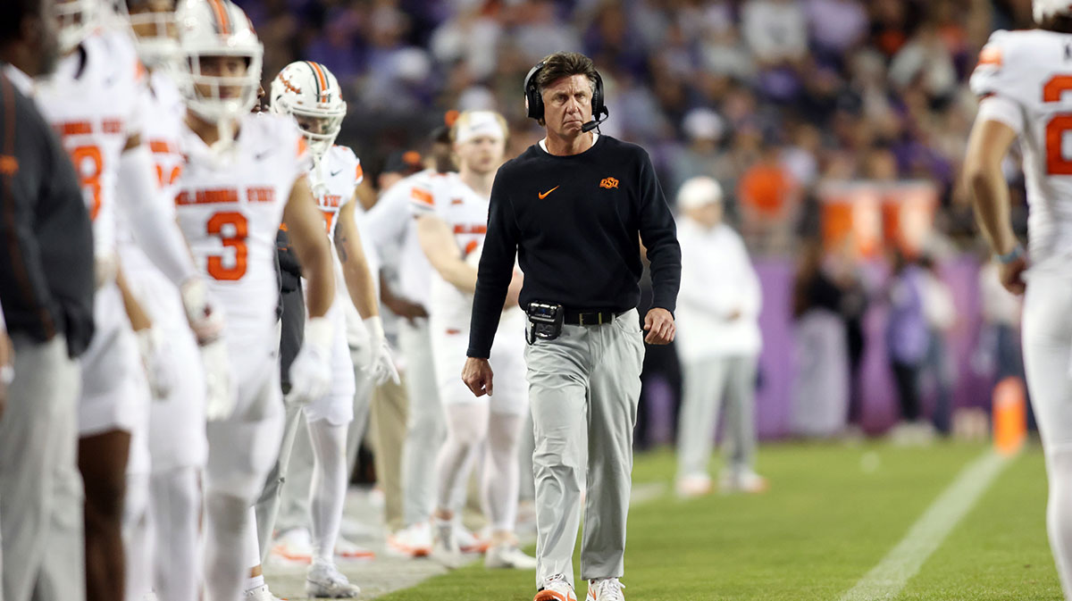 Nov 9, 2024; Fort Worth, Texas, USA; Oklahoma State Cowboys head coach Mike Gundy walks down the sidelines in the game against the TCU Horned Frogs at Amon G. Carter Stadium.