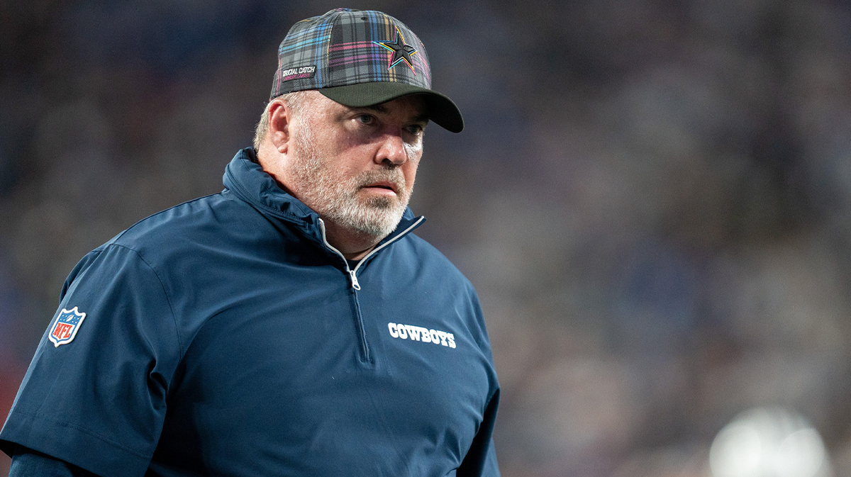 Dallas Cowboys head coach Mike McCarthy walks into the locker room at halftime at MetLife Stadium