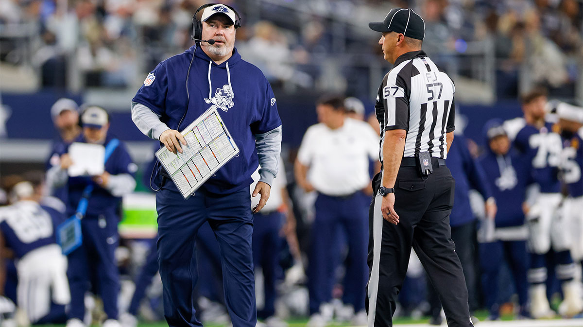 Dallas Cowboys Head Coach Mike McCarthy talks to the field judge during the second quarter against the New York Giants at AT&T Stadium.