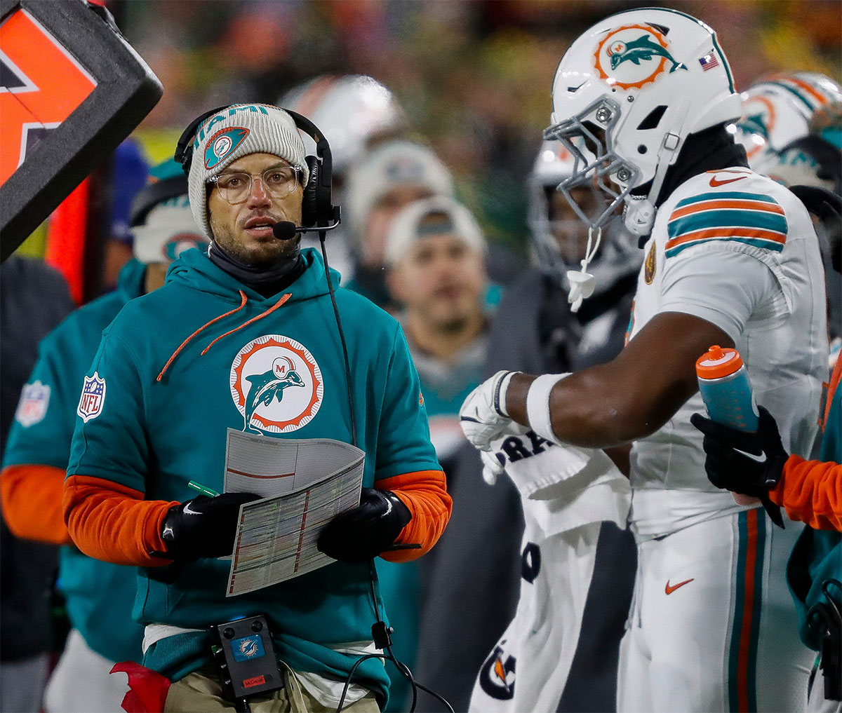 Miami Dolphins head coach Mike McDaniel paces the sideline during a game against the Green Bay Packers. The Packers won the game, 30-17.