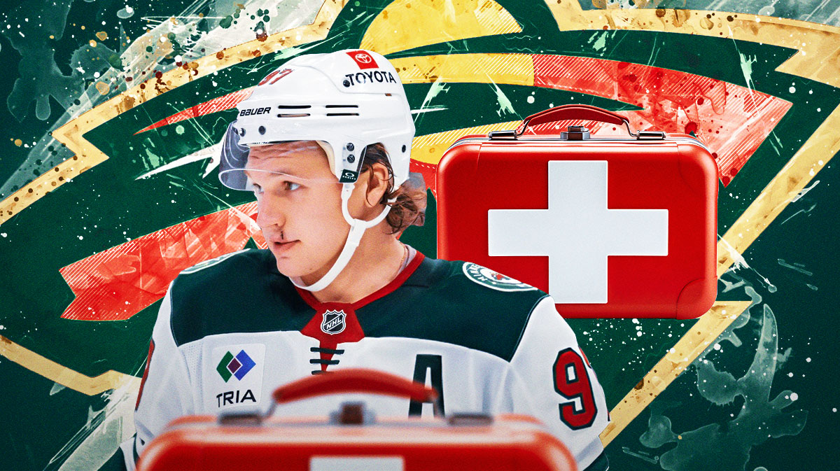 Minnesota Wild left winger Kirill Kaprizov with first-aid kits around him, and the Wild logo
