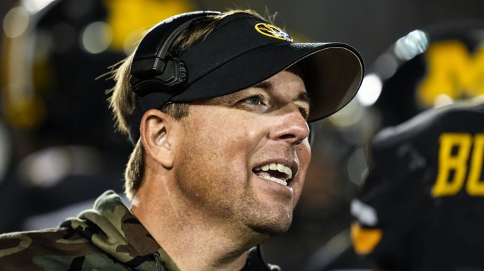 Missouri Tigers head coach Eliah Drinkwitz talks to players during a timeout in the second half against the Oklahoma Sooners at Faurot Field at Memorial Stadium.