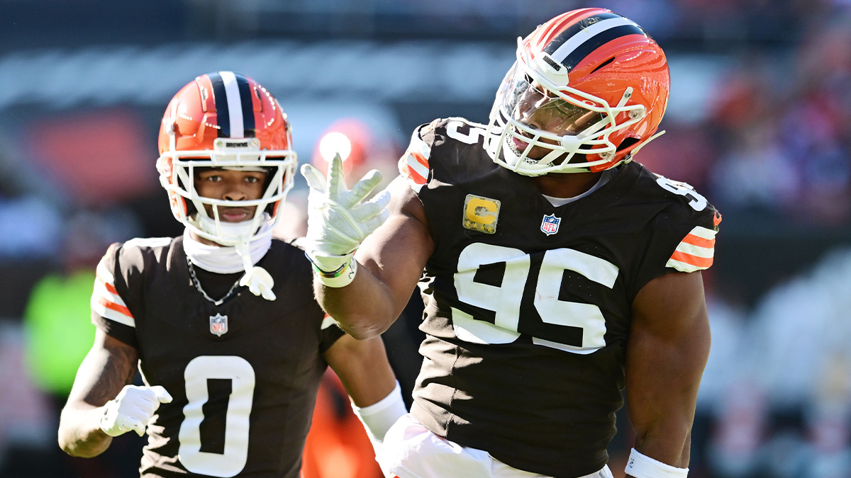 Nov 3, 2024; Cleveland, Ohio, USA; Cleveland Browns defensive end Myles Garrett (95) celebrates after sacking Los Angeles Chargers quarterback Justin Herbert (not pictured) for the third time during the first half at Huntington Bank Field.