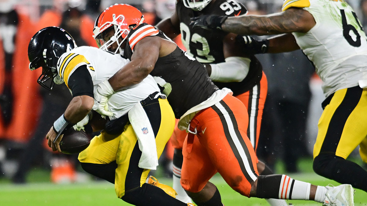 Cleveland Browns defensive end Myles Garrett (95) sacks Pittsburgh Steelers quarterback Russell Wilson (3) during the first half at Huntington Bank Field.