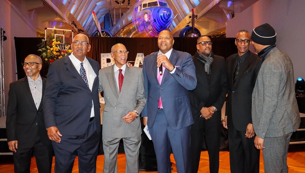 Retired basketball stars Dave Bing (red tie) and Derrick Coleman (pink tie) gather at the National Basketball Retired Players Association’s Black Excellence event in Detroit. The event honored Hall of Famer George Gervin (left of Bing) in addition to raising money to restore St. Cecilia’s gym, a Detroit landmark where several NBA players, including Gervin, would gather during the offseason to play pickup games.