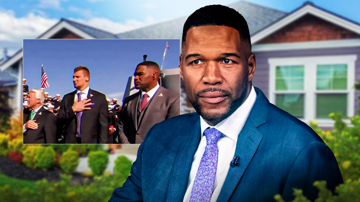 Angry Michael Strahan, and in the background the image of his refusing to put his hand over his heart