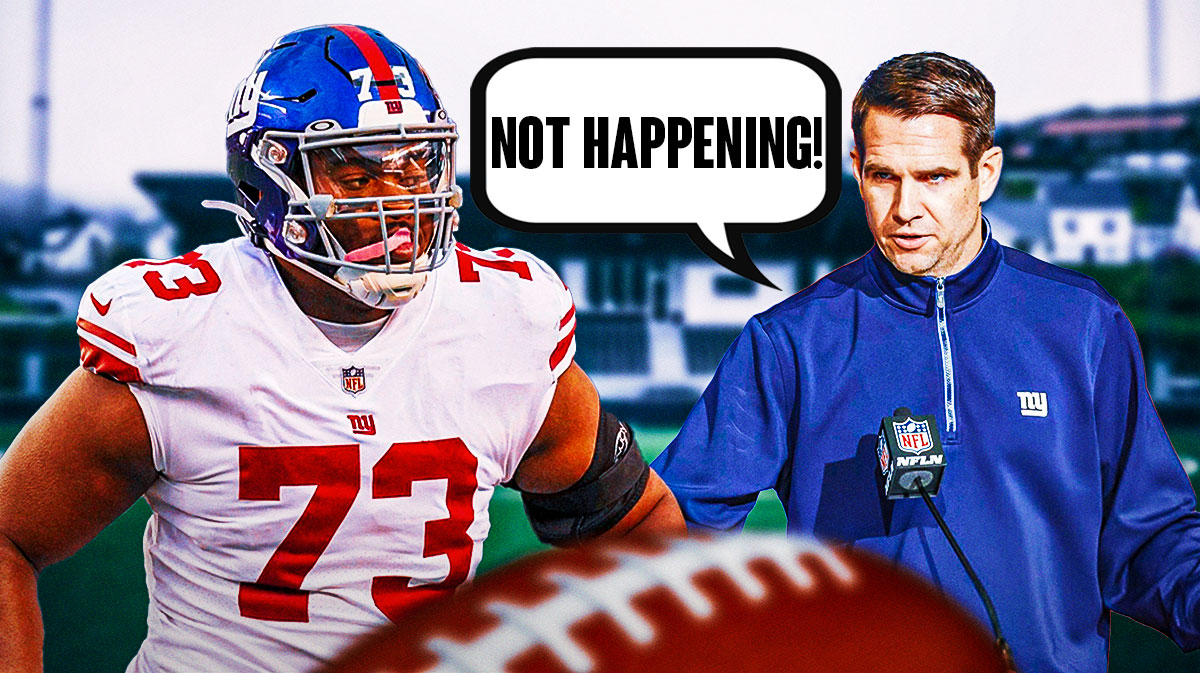 New York Giants general manager Joe Schoen and offensive tackle Evan Neal