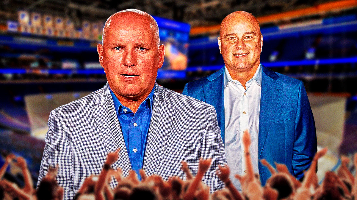 Blues GM Doug Armstrong and new coach Jim Montgomery inside Enterprise Center