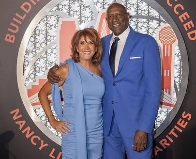 Nancy Lieberman (left) and Spencer Haywood (right) are two members of the National Basketball Retired Players Association’s board pushing for health insurance and pensions for retired women’s basketball players.