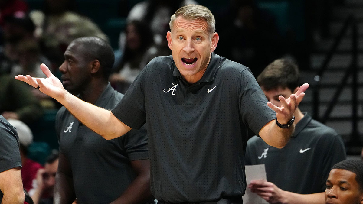 Alabama Crimson Tide head coach Nate Oats protests a call in favor of the Rutgers Scarlet Knights during the first half at MGM Grand Garden Arena.