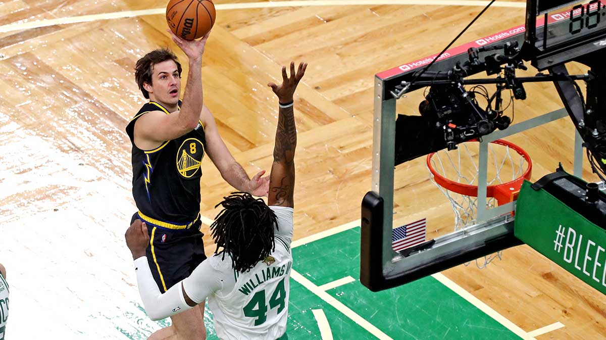 Gold state warriors forward Nemanja Bjelica (8) shoots the ball against the Boston Celtics Center Robert Williams III (44) during the second quarter in the game three of 2022 NBA finals in the TD garden. 