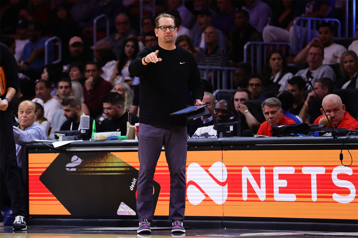 Philadelphia 76ers head coach Nick Nurse signals from the sideline against the Miami Heat during the fourth quarter at Kaseya Center.