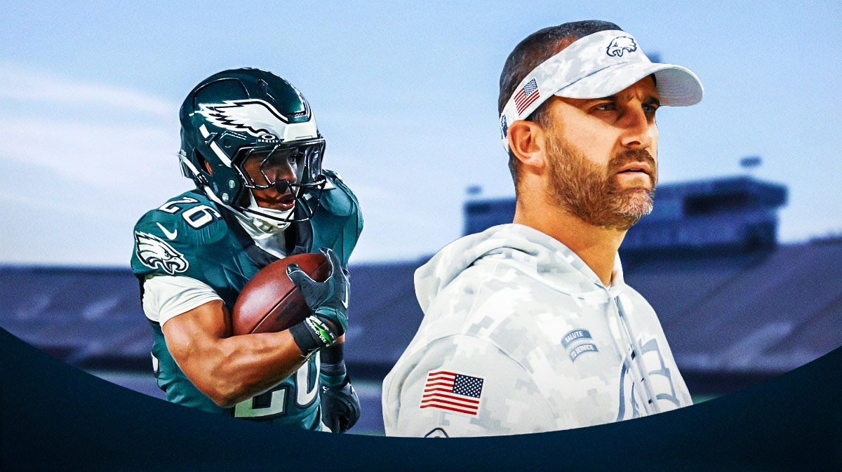 Philadelphia Eagles head coach Nick Sirianni and Saquon Barkley in front of Lincoln Financial Field.