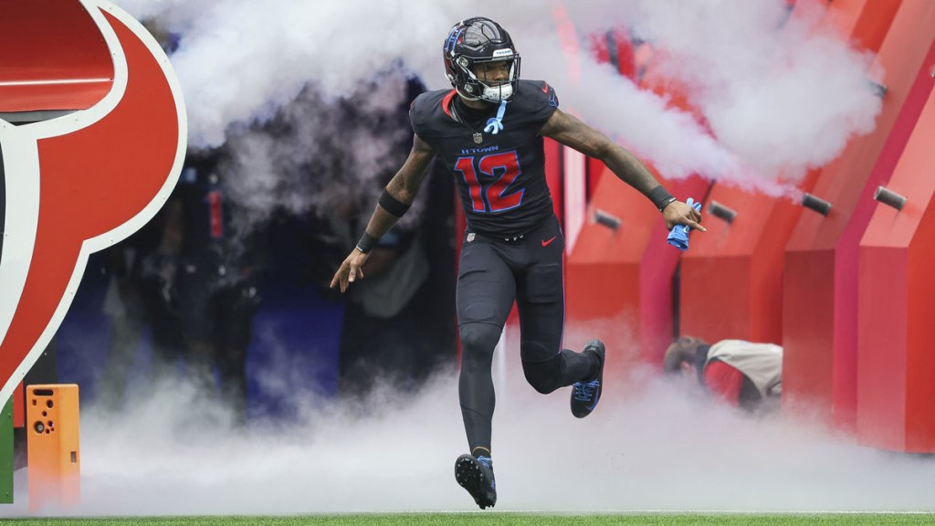 Houston Texans wide receiver Nico Collins (12) is introduced before the game against the Buffalo Bills at NRG Stadium.