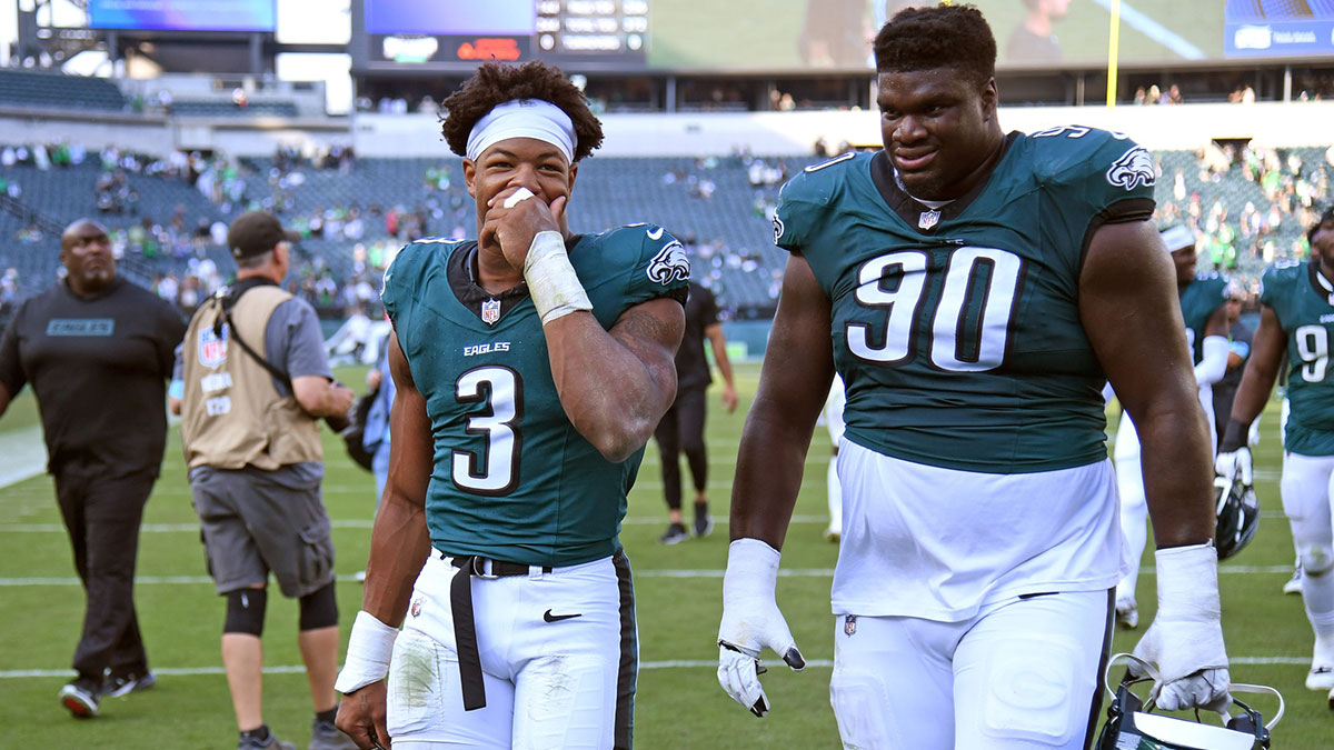 Philadelphia Eagles linebacker Nolan Smith Jr. (3) and defensive tackle Jordan Davis (90) walks off the field after win against the Cleveland Browns at Lincoln Financial Field.