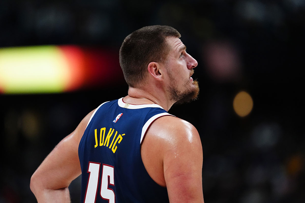 Denver Nuggets center Nikola Jokic (15) reacts in the first half against the Dallas Mavericks at Ball Arena.