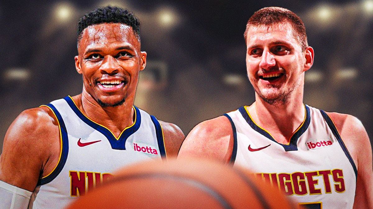 Russell Westbrook smiles next to Nikola Jokic