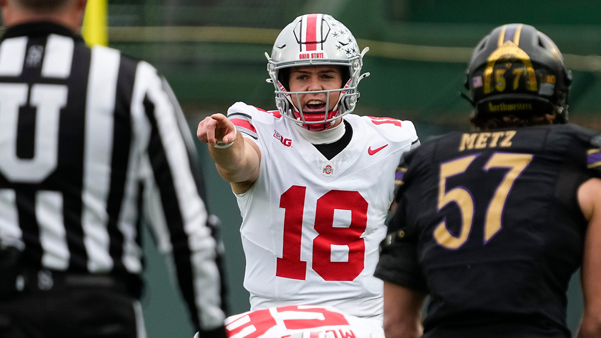 Ohio State Buckeyes quarterback Will Howard (18) calls out the defense during the NCAA football game against the Northwestern Wildcats at Wrigley Field in Chicago on Monday, Nov. 18, 2024. Ohio State won 31-7. 