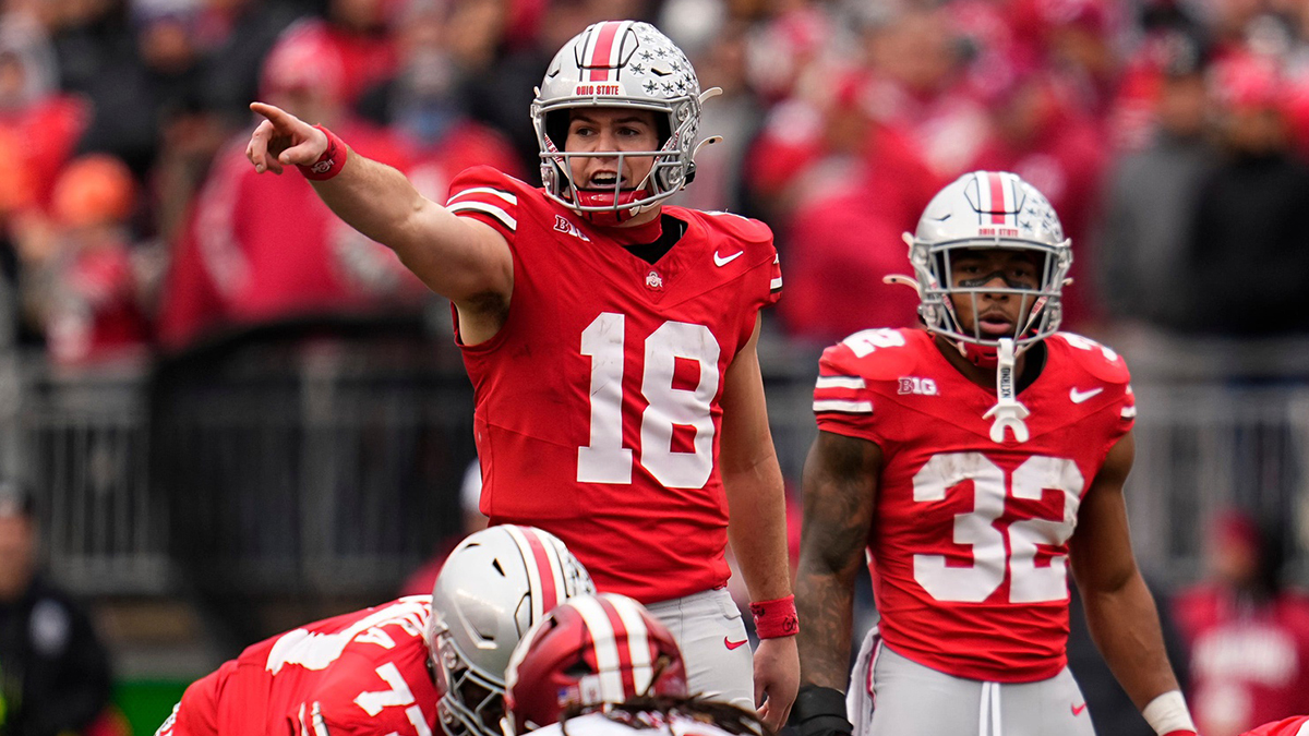 Ohio State Buckeyes quarterback Will Howard (18) signals to his offense during the second half of the NCAA football game against the Indiana Hoosiers at Ohio Stadium in Columbus on Saturday, Nov. 23, 2024. Ohio State won 38-15.