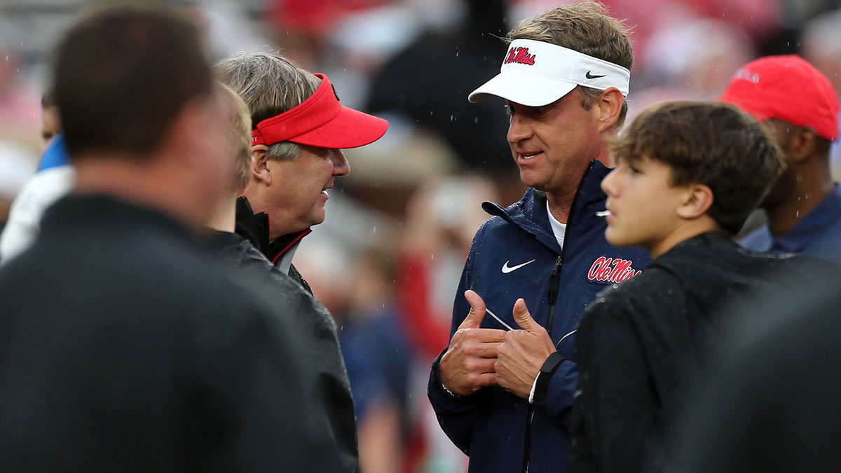 Georgia Bulldogs head coach Kirby Smart and Mississippi Rebels head coach Lane Kiffin talk prior to the game at Vaught-Hemingway Stadium