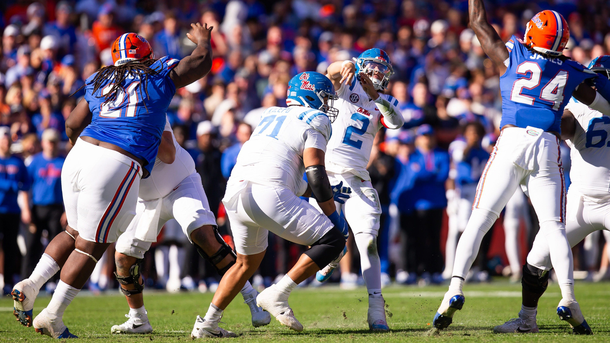 Mississippi Rebels quarterback Jaxson Dart (2) passes during the second half at Ben Hill Griffin Stadium in Gainesville, FL on Saturday, November 23, 2024. The Gators defeated the Rebels 24-17 [Doug Engle/Gainesville Sun]