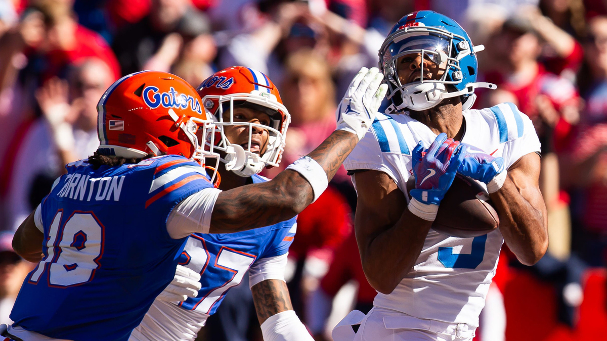 Mississippi Rebels wide receiver Tre Harris (9) hauls in a touchdown pass during the first half at Ben Hill Griffin Stadium in Gainesville, FL on Saturday, November 23, 2024. [Doug Engle/Gainesville Sun]