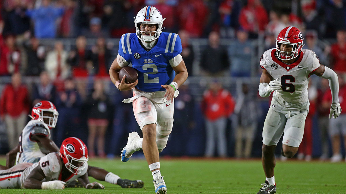 Mississippi Rebels quarterback Jaxson Dart (2) runs the ball during the second half against the Georgia Bulldogs at Vaught-Hemingway Stadium.