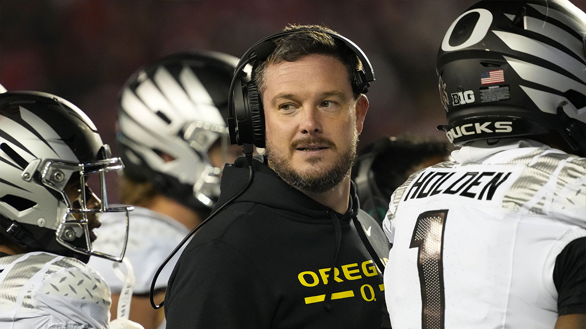 Oregon Ducks head coach Dan Lanning looks on during the third quarter against the Wisconsin Badgers at Camp Randall Stadium